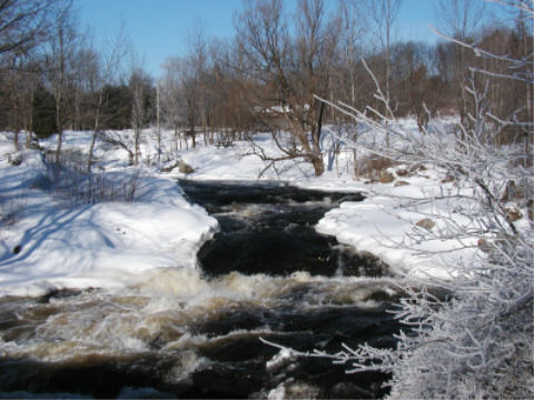 View from concrete bridge looking west